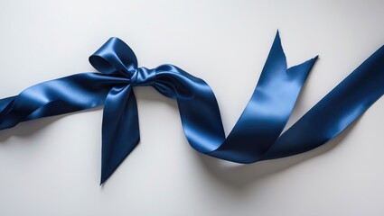 Dark blue satin bow ribbon and band for gift wrapping, greeting cards, and celebration decorations