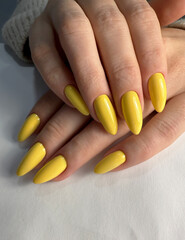 Yellow gel nail polish