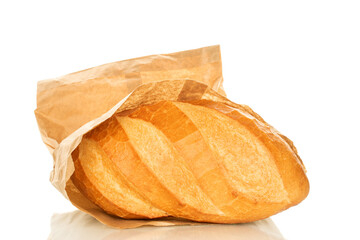 One wheat bun, close-up, isolated on a white background.