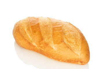 One wheat bun, close-up, isolated on a white background.