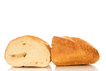 One wheat bun, close-up, isolated on a white background.