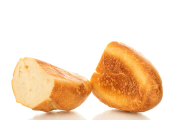 One wheat bun, close-up, isolated on a white background.