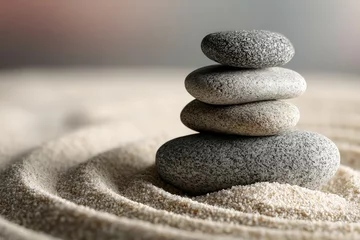 Calm zen garden with stacked stones and raked sand patterns in evening light