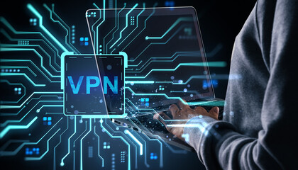 Person using laptop with VPN interface and glowing circuit lines on dark abstract background in cybersecurity and internet privacy concept.