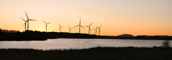 Fototapeta premium wind turbines at sunset