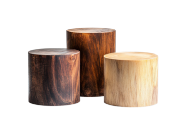 Three wooden cylinder blocks of different colors isolated on a black background