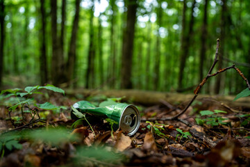 close-up trash, pet non-degradable thrown in the forest, recycling, protect nature, ecology