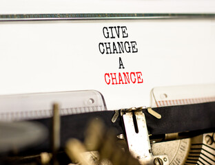 Give change a chance symbol. Concept words phrase Give change a chance typed on beautiful retro old...