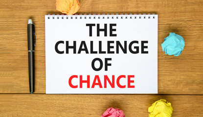 Fototapeta premium The challenge of chance symbol. Concept words phrase The challenge of chance on beautiful white note. Colored paper. Beautiful wooden background. Business The challenge of chance concept. Copy space.