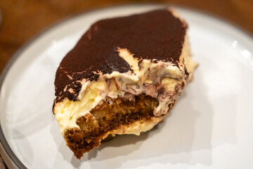 Tiramisu served on plate in the restaurant