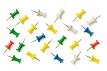 Colorful pushpins scattered on transparent surface, showcasing bright arrangement for office stationery design and graphic projects