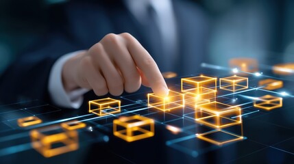 Businessman touching holographic interface with glowing orange cubes