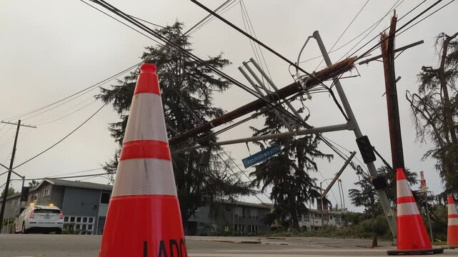 Power lines down with Orange and white cone