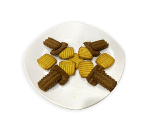 delicious biscuit in a plate isolated on white background