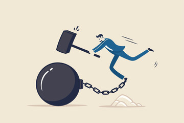 Break free or breaking bad habits or routines for freedom, pay off debt, destroy shackle or anxiety burden, escape and liberation concept, confidence businessman use hammer to break heavy chain burden