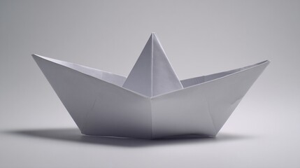 Elegant Paper Boat Origami on White Background with Water Reflection