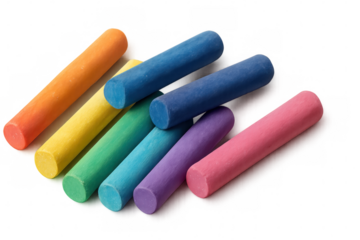 Vibrant chalk pastels displaying multicolored spectrum, lying against clear surface with artistic potential