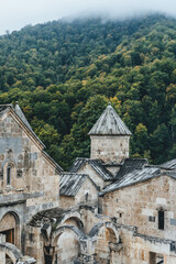 Fototapeta premium ancient stone medieval middle age church of the holy cross in the mountains armenia religion