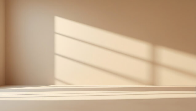 Beige room interior with sunlight and window shadows on the wall