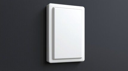 A white rectangular light switch on a dark gray wall.