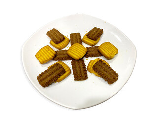Tasty biscuits arranged in plate isolated on white background