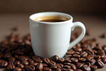 Fototapeta premium A cup of black coffee is sitting on the table with a sprinkle of some coffee beans.