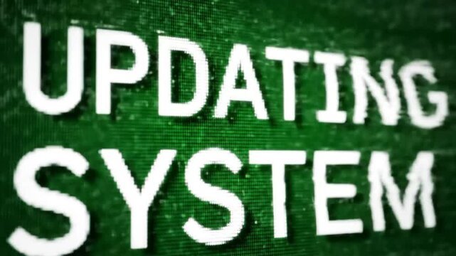 Updating System Pixelated Text Animation on Green Screen &ndash; Retro Digital UI Visual for Chroma Key and Tech Content

