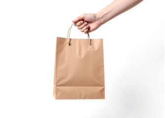 Hand Holding Brown Paper Shopping Bag on White Background - Minimal Packaging Concept