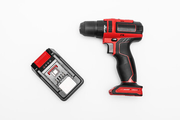 Cordless screwdriver with battery on a white background. isolate