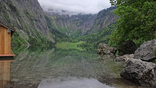 Obersee Lake reflects the surrounding Alps in Berchtesgaden National Park. A peaceful escape in southern Germany&rsquo;s natural paradise.