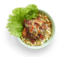 Isolated Delicious Bowl of Scrambled Eggs Topped With Vegetables and Fried Chicken with Sambal Matah Served With Fresh Lettuce