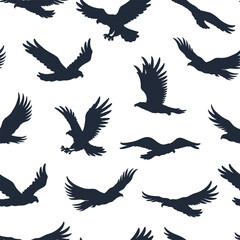 Pattern of birds soaring across a white background
