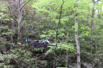 Drone flying over a waterfall.