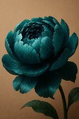 Fototapeta premium Teal flower blooming against a soft beige background 
