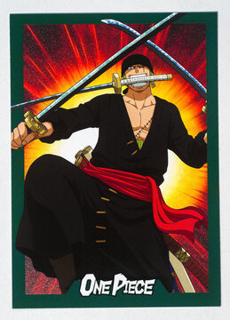 Hamburg, Germany - 05172025: photo of the English Panini One Piece 25th Anniversary paper Trading Card that shows the character called Roronoa Zoro. He is the swordsman of the Straw Hat Pirates.
