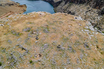 Aerial View of Ancient Settlement Remains along the Euphrates River with Surrounding Canyons – Hidden Archaeological Site in Southeastern Turkey
