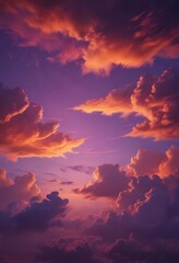 Fiery orange and purple clouds bleed across a vibrant twilight sky , aerial, rich, shadow