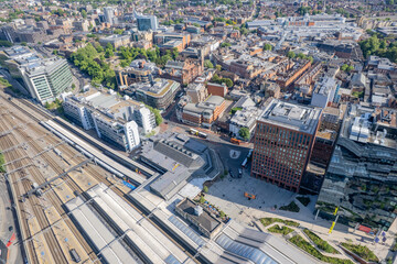 Epic aerial view of Reading center and railway station, and commercial buildings, Berkshire, United Kingdom