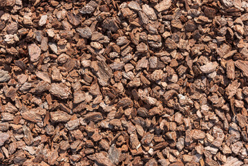 Decorative covering made from pieces of dry bark.