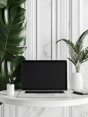Fototapeta premium An open laptop stands on table with plants. Light background. Front view. Computer mockup for design