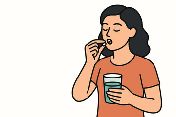 Woman taking a pill with water while standing indoors  