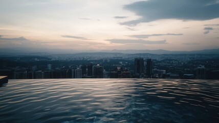 Rooftop Infinity Pool Overlooking Vibrant City Skyline at Sunset