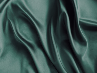 Obraz premium Dark gray silk satin fabric. Luxury elegant background for design. Wave line crumpled.