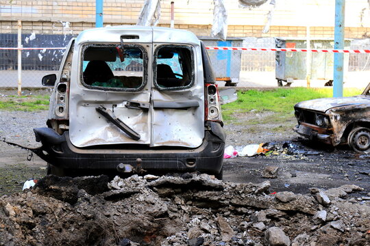 Burnt cars, the car interior burned. Russia s war against Ukraine, drone attack on Ukrainian city Dnipro, complete destruction of the car, war risk insurance