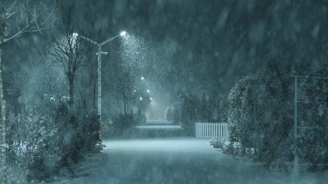 Night town street in cold winter snowstorm