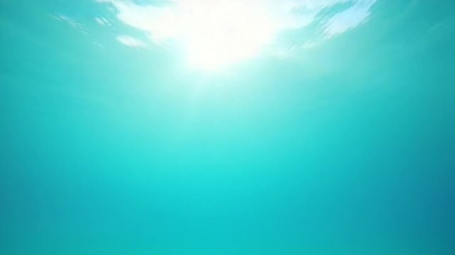 Sea water surface. Low angle view over clear azure sea water. Sun glare. Abstract nautical summer ocean nature. Holiday, vacation and travel concept. Nobody. Slow motion. Weather and climate change