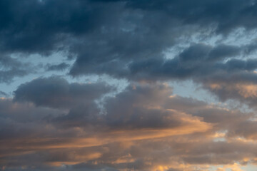 Colorful cloudy sky, toned effect photo background. Colorful cloudy sky at sunset, natural background photo. Cloudy sky at sunset.