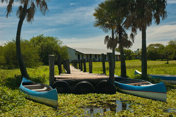 Canoes on a dock in the wetlands of Ibera in the province of Corrientes, Argentina