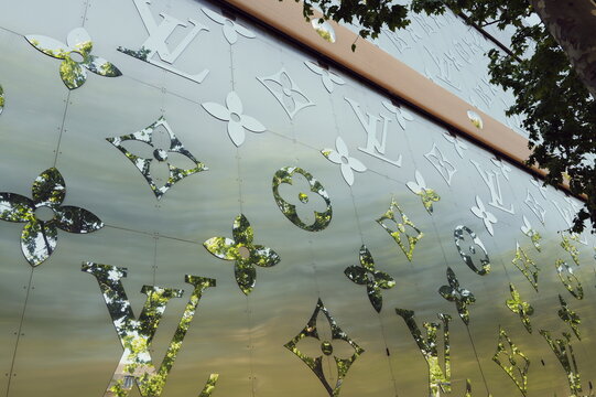 Louis Vuitton reflective store pattern on a flagship store in Paris, France