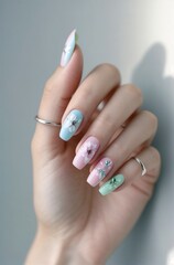 elicate Pastel Nail Art with Floral Accents

